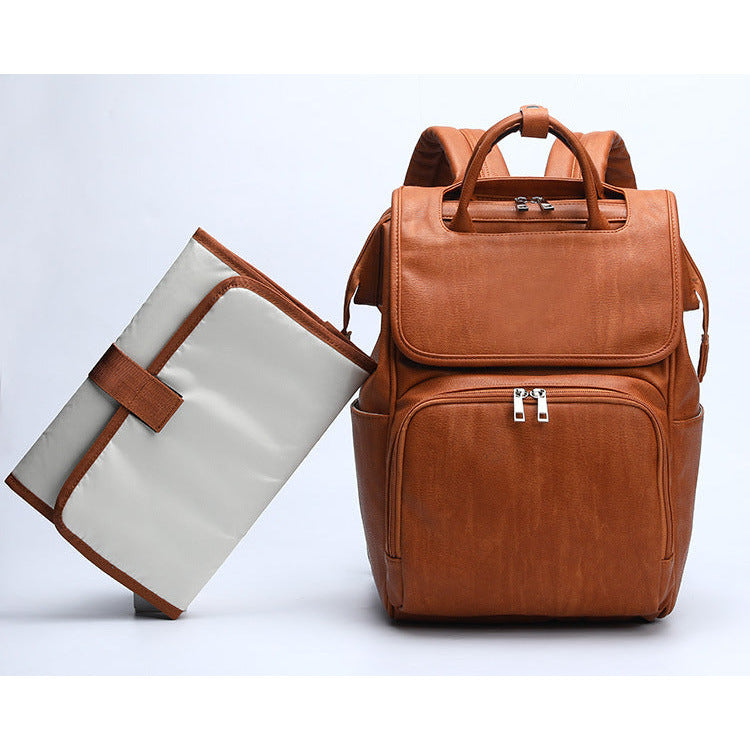 Pibi Mutipurpose PU Leather Diaper Backpack with Waterproof Changing Pad & Stroller Hooks Brown