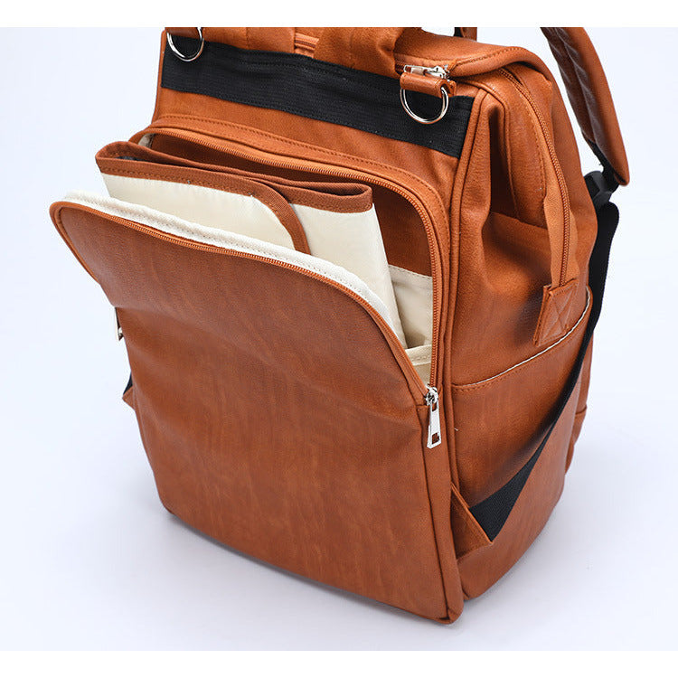 Pibi Mutipurpose PU Leather Diaper Backpack with Waterproof Changing Pad & Stroller Hooks Brown