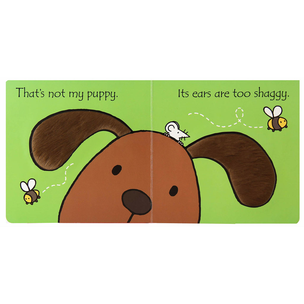 That's not my puppy... by Fiona Watt